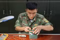 Thượng úy QNCN Trần Trung Anh đạt giải ba Giải thưởng “Tuổi trẻ sáng tạo” trong quân đội lần thứ 26. Ảnh: ĐVCC