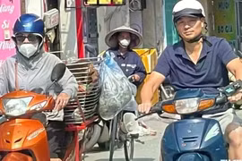 Áp thấp nhiệt đới suy yếu, nắng nóng trở lại miền Bắc và miền Trung