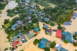 Ngập lụt trên diện rộng ở các phường Hà Giang 1, 2 (Tuyên Quang). (Ảnh: TTXVN phát)