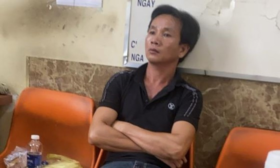 Dương Hoàng Việt Em tại cơ quan công an 