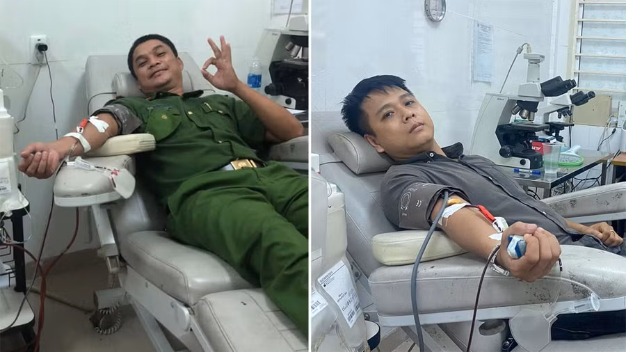 Đại úy Tào Viết Chung (trái) và thượng úy Trần Anh Khoa hiến tiểu cầu giúp đỡ bé Trân - con của người đồng đội mất vì ung thư. Ảnh: Duy Hùng