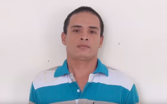 Nguyễn Văn Sơn tại cơ quan công an. 