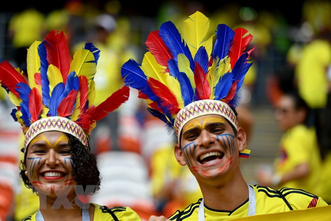 Cổ động viên của đội tuyển Colombia cổ vũ cho đội nhà trong trận đấu với Nhật Bản ở bảng H World Cup 2018 diễn ra tại Saransk, Nga ngày 19/6. (Nguồn: THX/TTXVN) Cổ động viên của đội tuyển Colombia cổ vũ cho đội nhà trong trận đấu với Nhật Bản ở bảng H World Cup 2018 diễn ra tại Saransk, Nga ngày 19/6. (Nguồn: THX/TTXVN)