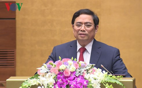  Trưởng Ban Tổ chức Trung ương Phạm Minh Chính giới thiệu Nghị quyết về công tác cán bộ (Ảnh: Dũng Hiền)