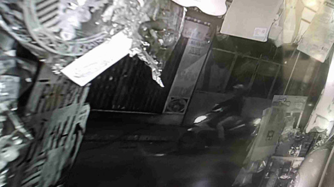 Nghi phạm nổ súng được camera ghi lại Nghi phạm nổ súng được camera ghi lại