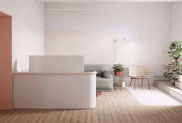 Một bức tường thấp ngăn phòng khách với những khu vực chức năng khác trong nhà.