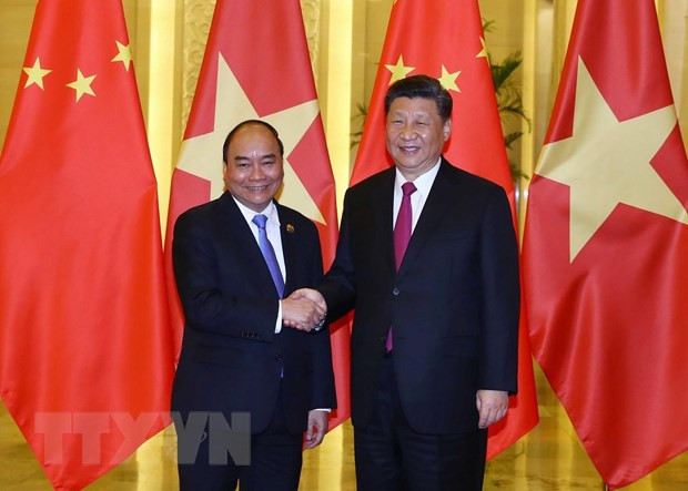 Thủ tướng Nguyễn Xuân Phúc hội kiến Tổng Bí thư, Chủ tịch nước Trung Quốc Tập Cận Bình. (Ảnh: Thống Nhất/TTXVN) Thủ tướng Nguyễn Xuân Phúc hội kiến Tổng Bí thư, Chủ tịch nước Trung Quốc Tập Cận Bình. (Ảnh: Thống Nhất/TTXVN)