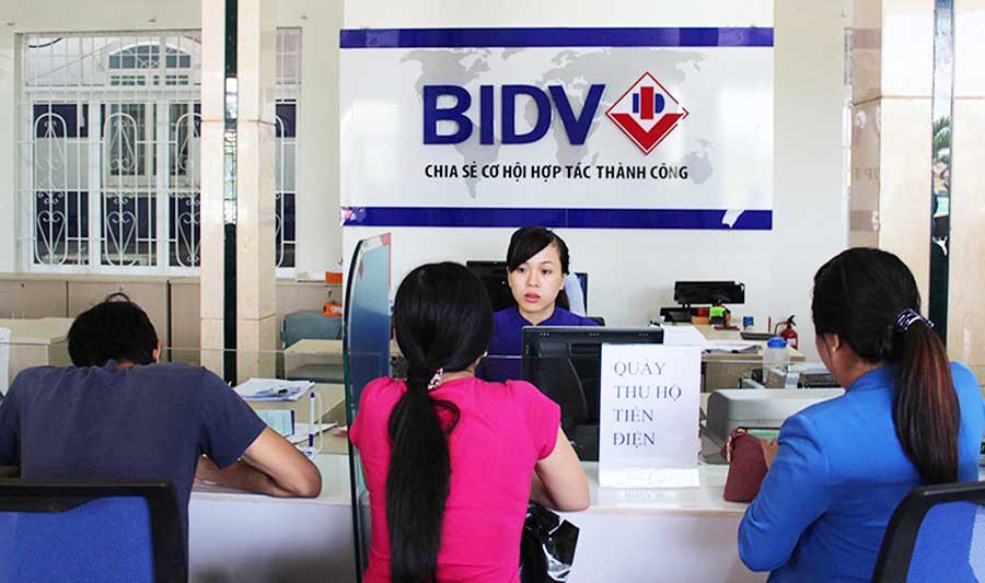 Dịch vụ thu hộ tiền điện tại Ngân hàng Thương mại cổ phần Đầu tư và Phát triển Việt Nam. Ảnh: H.D