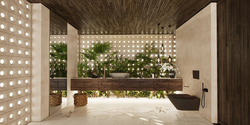 Một phần tường phòng tắm được trang trí bằng cây xanh.