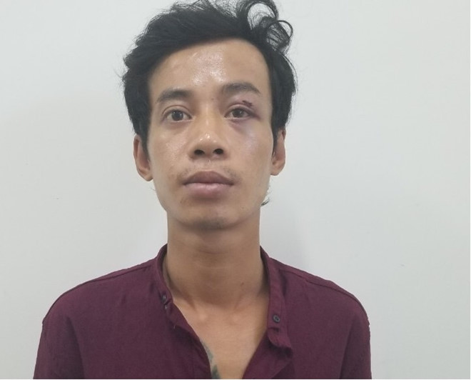 Nguyễn Thanh Sơn bị tạm giữ - Ảnh: Văn Tiến