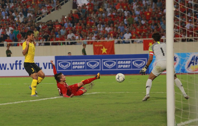 Pha ghi bàn của Quang Hải - Ảnh Ngô Nhung