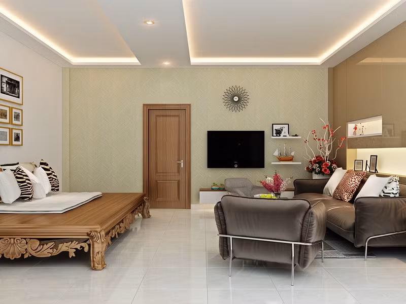 Phòng có sự kết hợp giữa bộ bàn ghế sofa với chiếc sập gỗ độc đáo. Trên chiếc sập gỗ này chủ nhà có thể tiếp đãi khách khứa hay nằm nghỉ trưa đều thuận tiện.