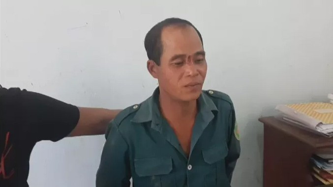 Nghi phạm Hoàng Văn Tưởng tại cơ quan công an