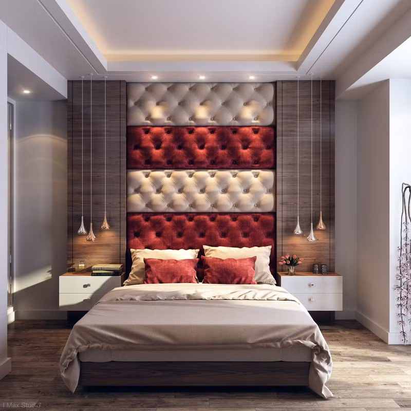 Sử dụng đầu giường và gối màu đỏ xua tan cảm giác nhàm chán cho căn phòng.