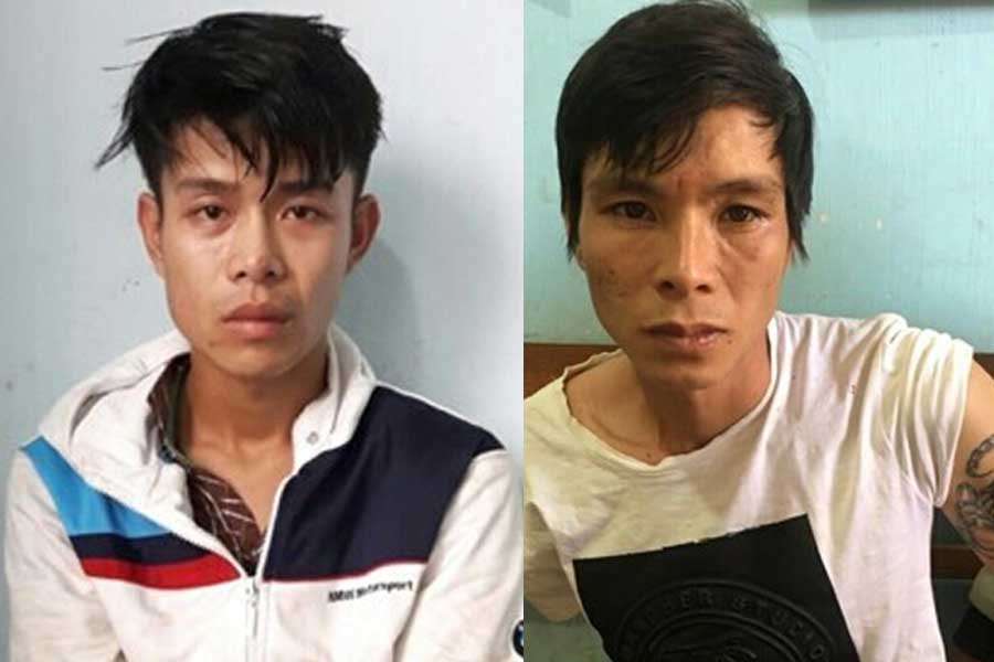  Hai đối tượng Ngô Thanh Hùng (trái) và Hồ Đức Văn. Ảnh: Lê Anh 