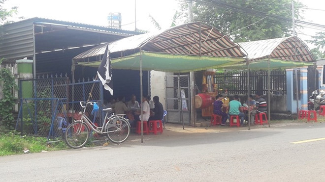 Gia đình làm lễ tang cho nạn nhân Quang.