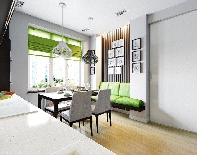 Chiếc rèm và ghế sofa màu xanh cốm đã làm nổi bật cho căn phòng trưng bày những vật dụng đơn giản