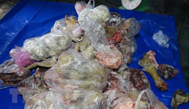 1 tấn thịt lợn bị lở mồm long móng chuẩn bị đưa vào chợ đầu mối Bình Điền tiêu thụ. Ảnh minh họa. (Ảnh: Đậu Tất Thành/TTXVN)