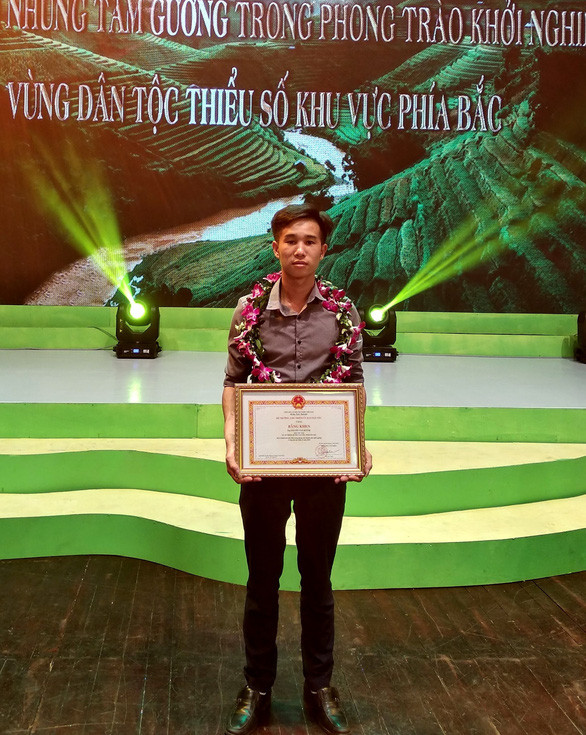 Nguyễn Văn Huỳnh trong lễ tuyên dương những tấm gương khởi nghiệp vùng dân tộc thiểu số khu vực phía Bắc - Ảnh: H.N.V.