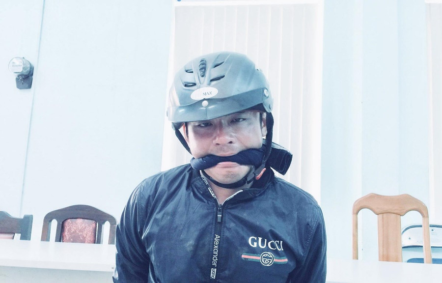  Nghi can Nguyễn Hoàng Nam tại Cơ quan Công an. (Ảnh: Thành Chung/TTXVN)