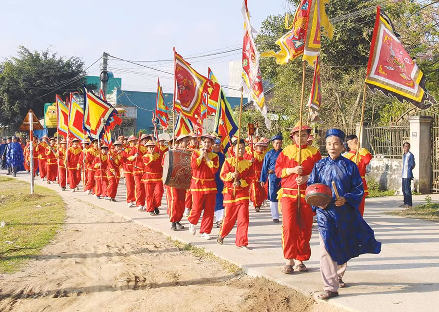 Nghi lễ rước Sắc thần từ An Khê đình về An Khê trường. Ảnh: A.P