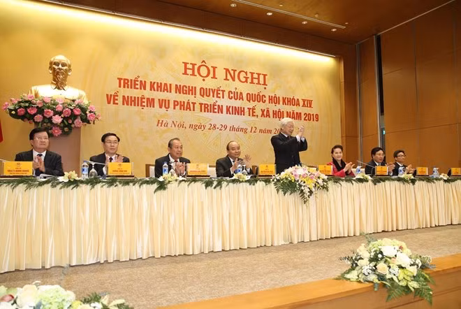 Tổng Bí thư, Chủ tịch nước Nguyễn Phú Trọng; Thủ tướng Chính phủ Nguyễn Xuân Phúc; Chủ tịch Quốc hội Nguyễn Thị Kim Ngân và các Phó Thủ tướng chủ trì hội nghị Chính phủ với các địa phương. (Ảnh: Trí Dũng/TTXVN)