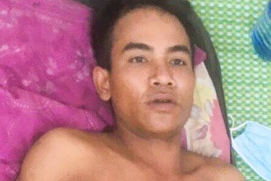  Bị can Hồ Văn Dên tại bệnh viện. Ảnh: Công an