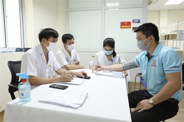 Khu vực khám sàng lọc trước tiêm cho các tình nguyện viên tham gia tiêm thử nghiệm đợt 3 vaccine Nano Covax phòng COVID-19 tại Học viện Quân y. (Ảnh: Minh Quyết/TTXVN)  Khu vực khám sàng lọc trước tiêm cho các tình nguyện viên tham gia tiêm thử nghiệm đợt 3 vaccine Nano Covax phòng COVID-19 tại Học viện Quân y. (Ảnh: Minh Quyết/TTXVN)