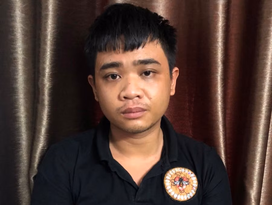 Nghi phạm Lý Ngọc Triều Phương tại trụ sở công an Ảnh: C.T.V.