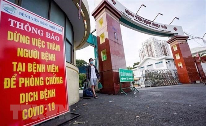 Bệnh viện Bệnh nhiệt đới Thành phố Hồ Chí Minh tạm dừng việc thăm người bệnh nhằm phòng, chống dịch COVID-19. (Ảnh: Thu Hương/TTXVN)  Bệnh viện Bệnh nhiệt đới Thành phố Hồ Chí Minh tạm dừng việc thăm người bệnh nhằm phòng, chống dịch COVID-19. (Ảnh: Thu Hương/TTXVN)