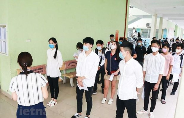  Năm 2021, kỳ thi tiếp tục được diễn ra trong bối cảnh dịch COVID-19 như năm 2020. (Ảnh: PV/Vietnam+)