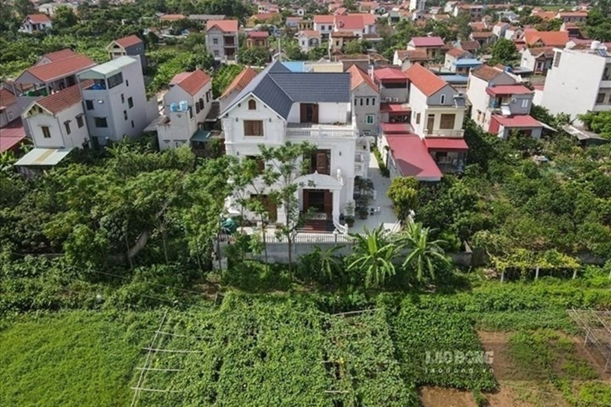 Luật Đất đai 2013 quy đinh chi tiết về 11 trường hợp người dân được sử dụng đất ổn định lâu dài. Ảnh minh hoạ: Phan Anh