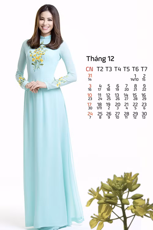 Hoa hậu Phạm Hương mặc tà áo dài thêu họa tiết hoa cải trong tờ lịch của tháng 12.
