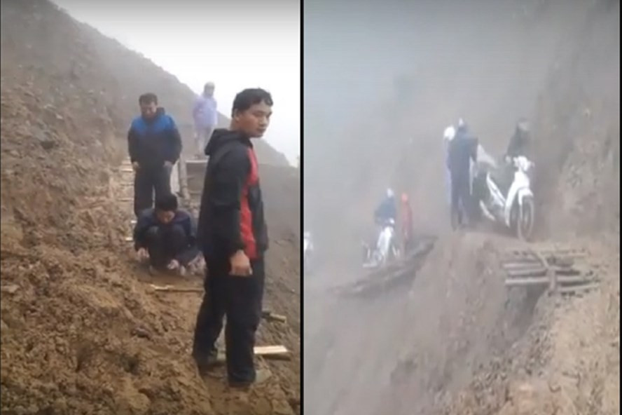 Các thầy cô giáo tự tay đóng lại các tấm ván gỗ nối đoạn đường hư hỏng và giúp đỡ nhau đi qua con đường hiểm trở bên vách núi. Ảnh: VX.