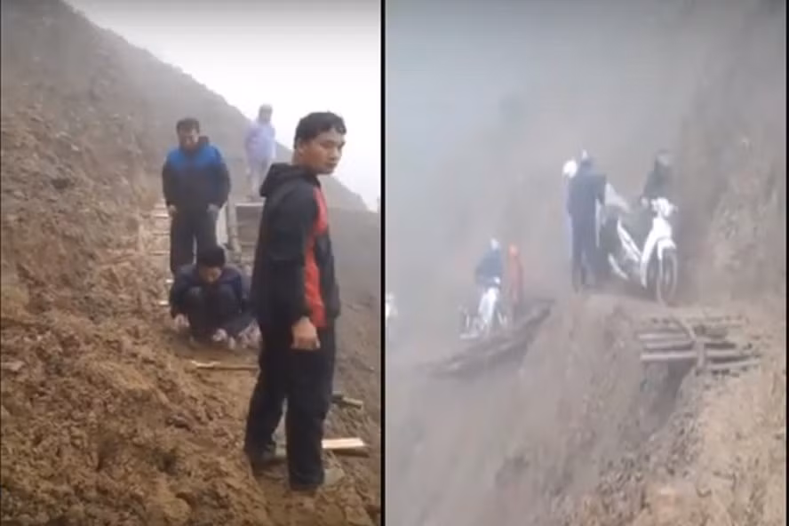 Các thầy cô giáo tự tay đóng lại các tấm ván gỗ nối đoạn đường hư hỏng và giúp đỡ nhau đi qua con đường hiểm trở bên vách núi. Ảnh: VX.