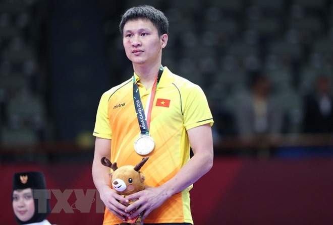 Võ sỹ Nguyễn Minh Phụng giành huy chương bạc Karate hạng cân trên 84kg. (Ảnh: Hoàng Linh/TTXVN) Võ sỹ Nguyễn Minh Phụng giành huy chương bạc Karate hạng cân trên 84kg. (Ảnh: Hoàng Linh/TTXVN)