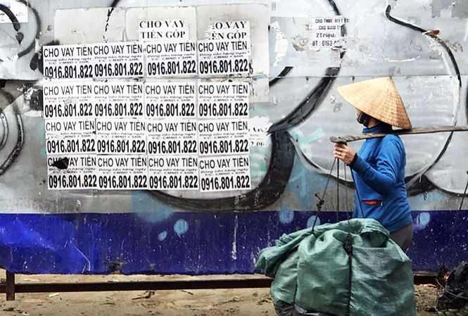 Tín dụng đen giăng mắc, vây bọc người nghèo. Ảnh:pv.