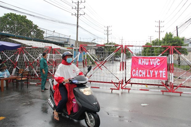 Một khu vực được phong tỏa tạm thời để điều tra dịch tễ liên quan đến ca mắc COVID-19. (Ảnh minh họa: TTXVN)