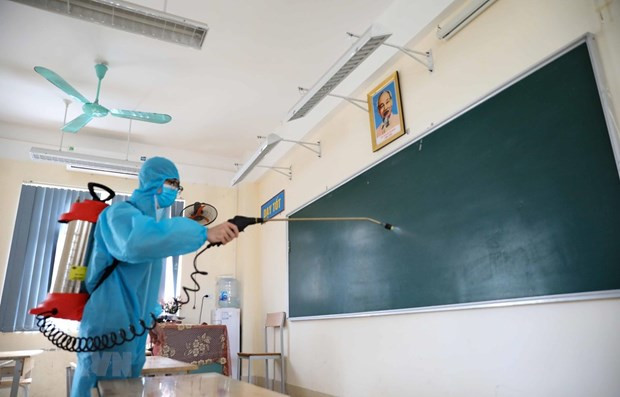 Các điểm thi được phun khử khuẩn trước kỳ thi và sau mỗi buổi thi. (Ảnh: TTXVN) Các điểm thi được phun khử khuẩn trước kỳ thi và sau mỗi buổi thi. (Ảnh: TTXVN)