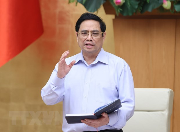 Thủ tướng Phạm Minh Chính chủ trì cuộc họp khẩn của Chính phủ với Ban Chỉ đạo Quốc gia phòng, chống COVID-19 để nghe báo cáo tình hình dịch bệnh, trên cơ sở đó xem xét, quyết định những giải pháp mạnh mẽ hơn, quyết liệt hơn trước những diễn biến dịch phức tạp hiện nay. (Ảnh: Dương Giang/TTXVN)