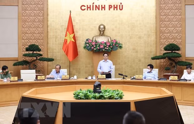 Quang cảnh cuộc họp Chính phủ với Ban Chỉ đạo quốc gia phòng, chống dịch COVID-19. (Ảnh: Dương Giang/TTXVN)