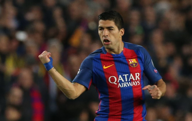 Niềm vui của Suarez sau khi mở tỷ số cho Barcelona. Ảnh: Reuters Niềm vui của Suarez sau khi mở tỉ số cho Barcelona. Ảnh: Reuters