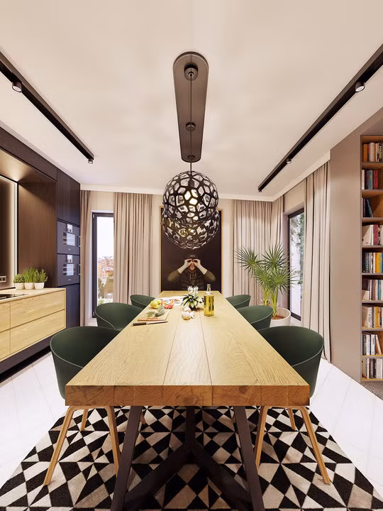 Thảm màu đen, trắng đánh dấu khu vực bàn ăn so với lối đi và tủ bếp.