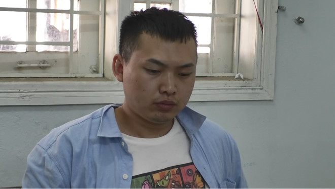 Nghi can Tiêu Quý Bình tại Cơ quan công an - Ảnh: Văn Tiến