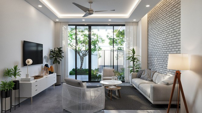 Phòng khách hướng ra khu vực sân trước để lấy sáng.