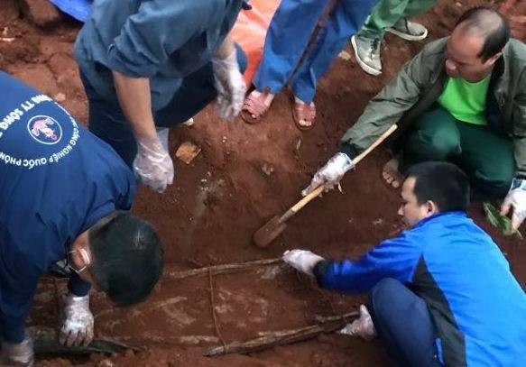  Hài cốt liệt sĩ được tìm thấy. Ảnh: H.Minh.