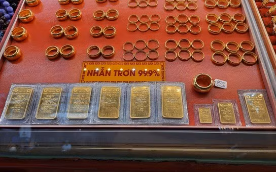 Giá vàng giảm khi USD suy yếu