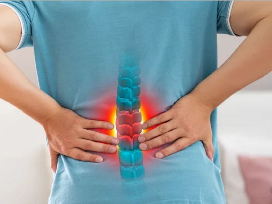 Đau lưng dưới có thể gây khó ngủ và cản trở vận động. Ảnh: SHUTTERSTOCK