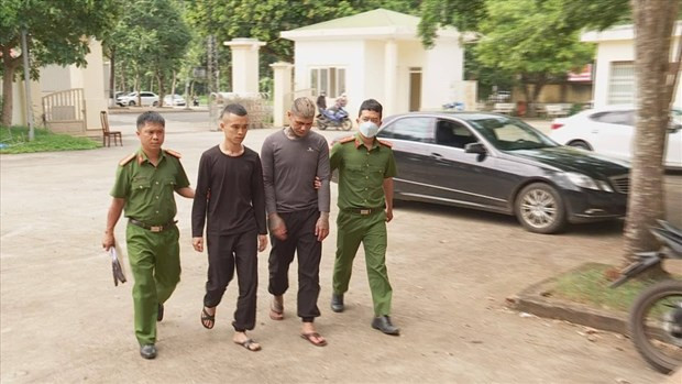 Trần Nam Giang và Trần Văn Hiệp bị lực lượng chức năng bắt giữ. Nguồn: Lao Động