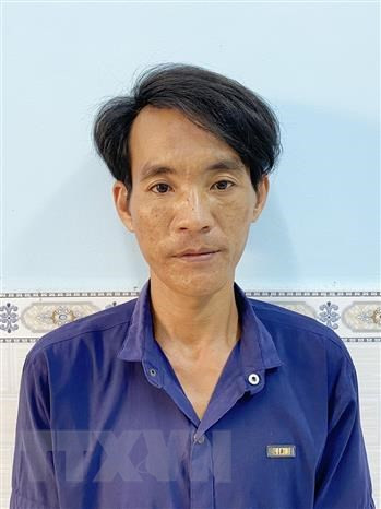 Đối tượng Mai Văn Hiếu tại cơ quan điều tra. Ảnh: TTXVN phát